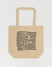 Load image into Gallery viewer, Swirly text effect of the quote "creativity is contagious" on a tote bag