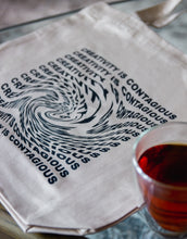 Load image into Gallery viewer, Distorted swirl text effect of an art quote on a tote bag