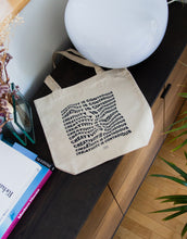 Load image into Gallery viewer, Creativity Is Contagious art quote tote bag with a warped text effect