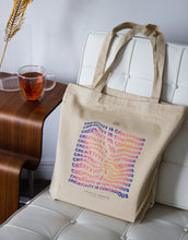 Load image into Gallery viewer, Wavy distorted text effect of an art quote on a tote bag
