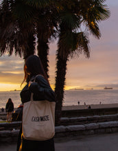 Load image into Gallery viewer, Ink bleed text effect on a tote bag