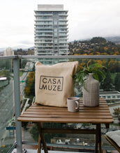Load image into Gallery viewer, Casa Muze logo with a blur effect on a tote bag