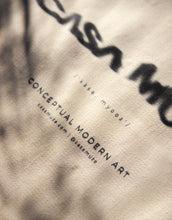 Load image into Gallery viewer, Distorted ink bleed text effect on a canvas tote bag