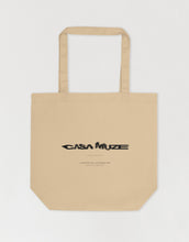 Load image into Gallery viewer, Casa Muze with a motion blur effect on a canvas tote bag