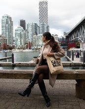 Load image into Gallery viewer, Warped text ink bleed effect on a tote bag