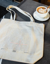 Load image into Gallery viewer, Canvas tote bag design with a word search graphic