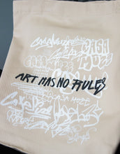 Load image into Gallery viewer, Artistic tote bag with the quote &quot;art has no rules&quot; written in a graffiti style
