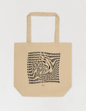 Load image into Gallery viewer, Swirly text effect of the quote &quot;creativity is contagious&quot; on a tote bag
