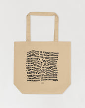 Load image into Gallery viewer, Wavy text effect of an art quote on a tote bag
