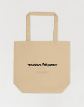 Load image into Gallery viewer, Casa Muze with a motion blur effect on a canvas tote bag
